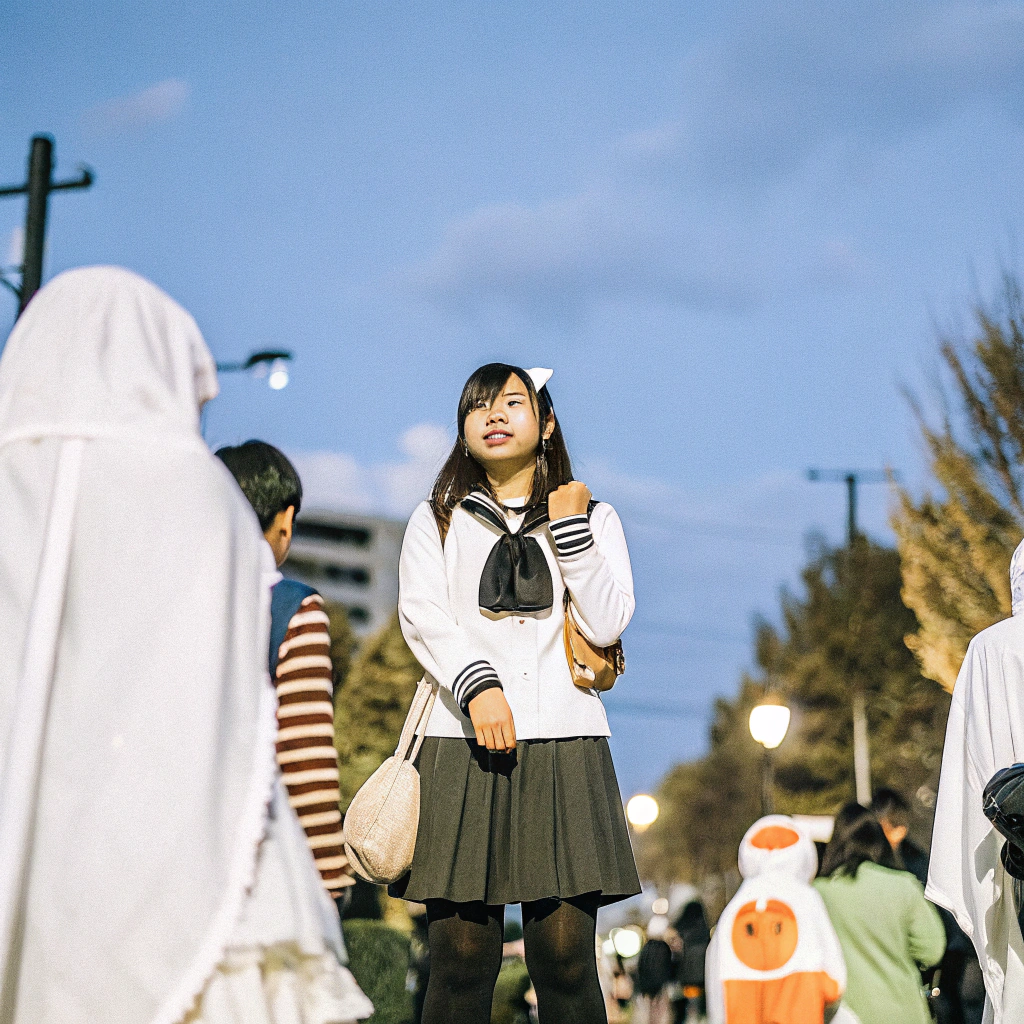 AI generated image by FLUX.1-schnell: Normal japan high school girl in the halloween crowd